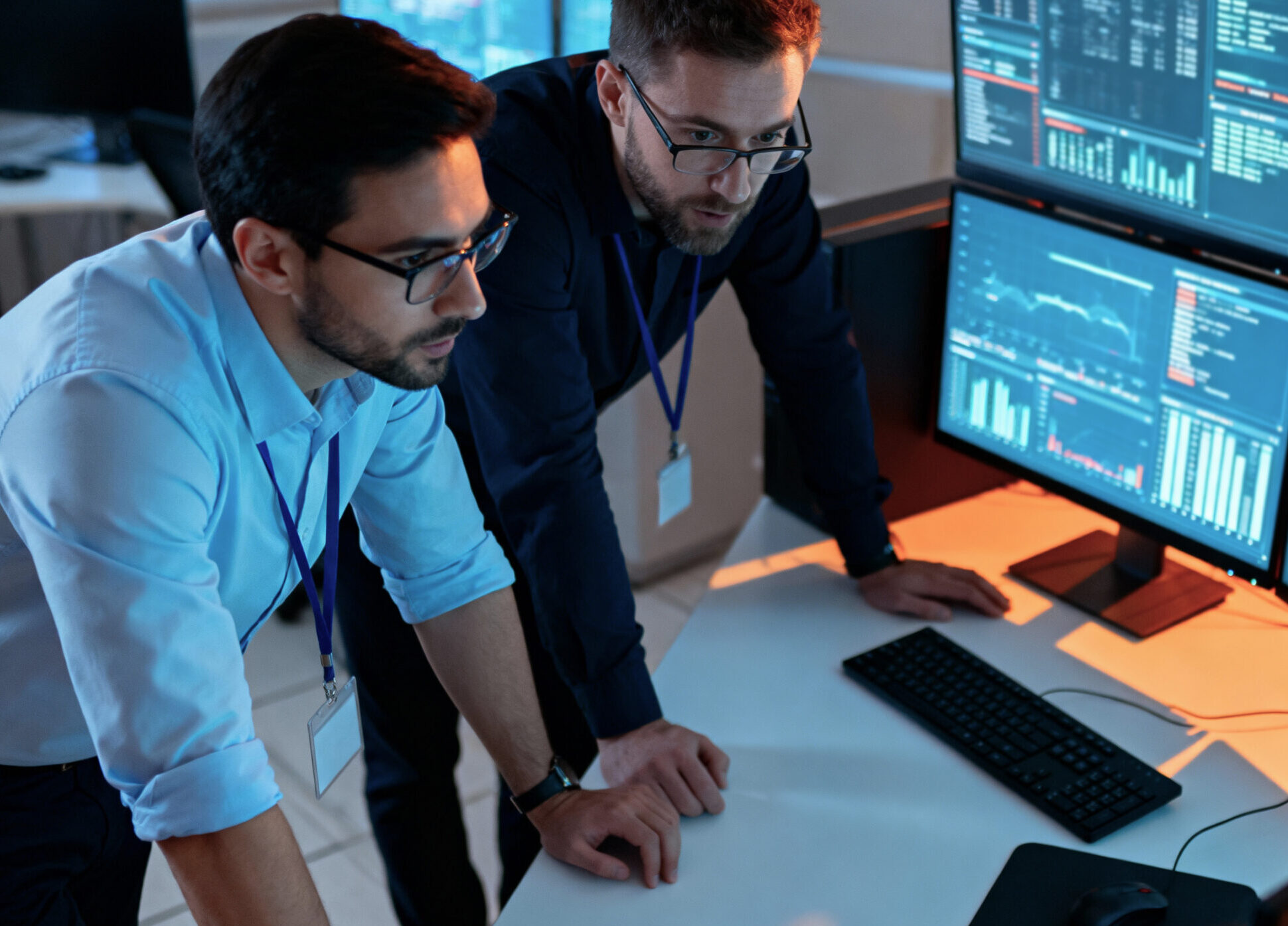 IT professionals analyzing data